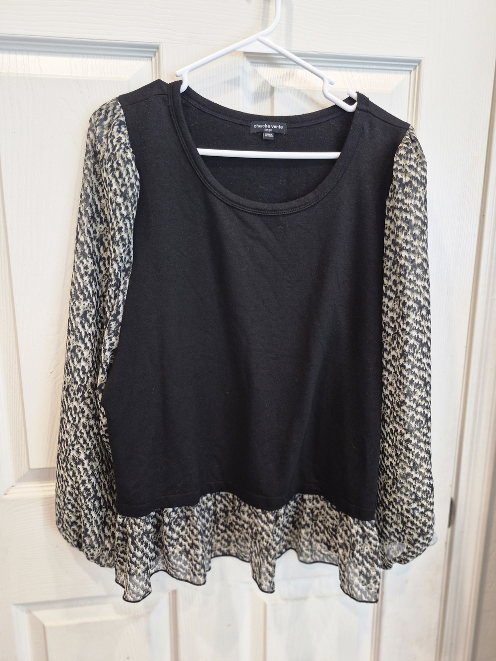 Black Top with Patterned Sleeves